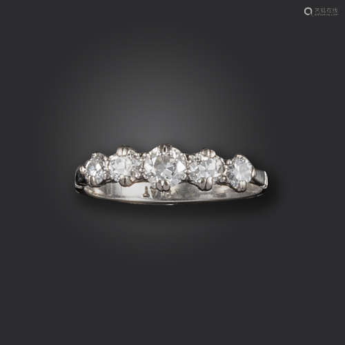 A diamond five-stone ring, set with graduated old circular-cut diamonds in platinum, size R 1/2