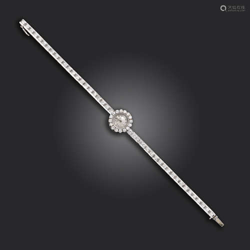 A lady's diamond cocktail wristwatch by Jaeger LeCoultre, the signed dial within diamond-set case on