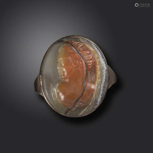A 17th century banded agate cameo depicting the portrait bust of a lady, in a 19th century gold