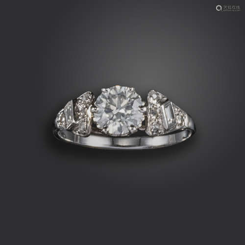 A diamond solitaire ring, the round brilliant-cut diamond weighs approximately 0.95cts, set with