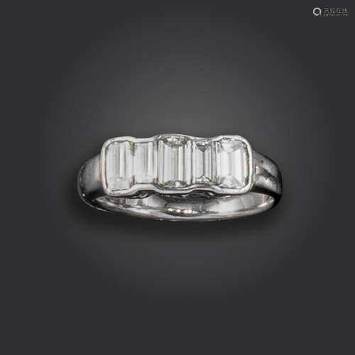 A diamond five-stone ring, set with baguette-shaped diamonds in platinum, maker's mark SB,