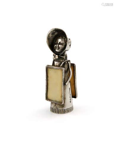 A rare Edwardian novelty silver Suffragette pepper pot, by Saunders and Shepherd, Chester 1908,