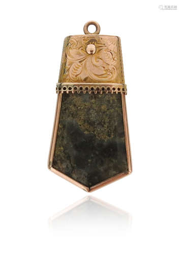 A 19th century gold pendant, suspending a section of gold bearing quartz from foliate yellow gold