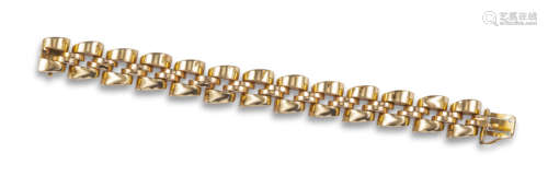 A French gold tank track bracelet, c1940, the stylised semi-spherical links in bi-colour gold,