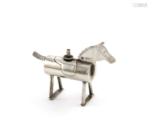 An Edwardian novelty silver table cigar lighter, by the Goldsmiths and Silversmiths Company,
