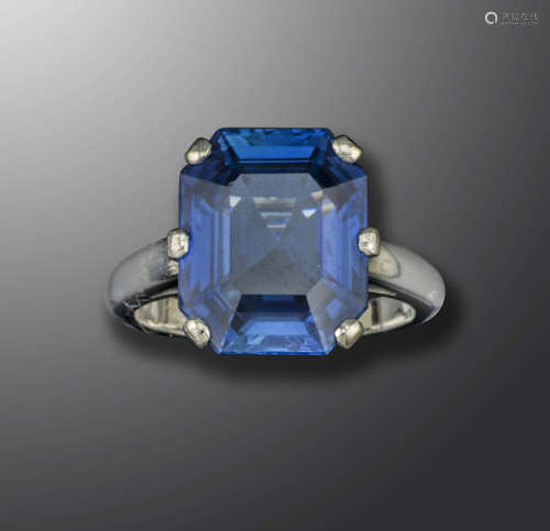 An octagonal-cut sapphire ring by Cartier, the sapphire weighs 9.50cts and set in platinum, signed