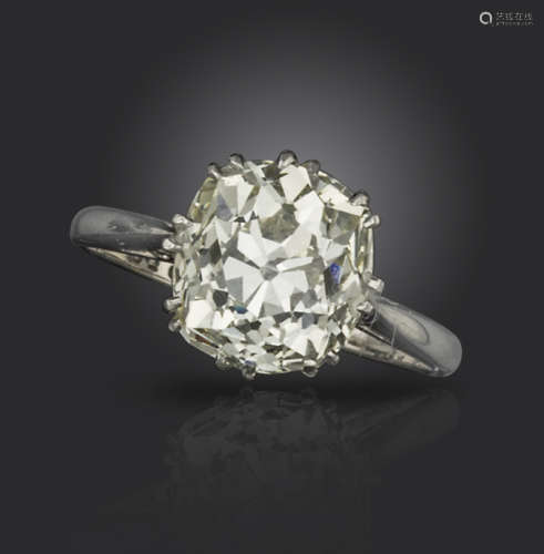 A diamond solitaire ring, the old cushion-shaped diamond weighs 3.82cts, claw-set in platinum and