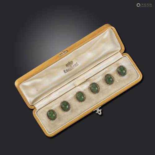 An early 20th century set of six carved nephrite scarab buttons by Fabergé, realistically formed
