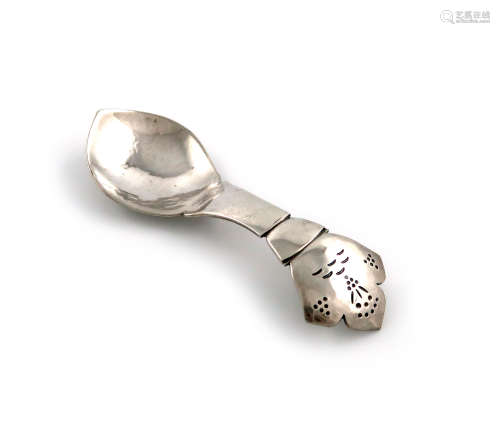 By H. G. Murphy, an Arts and Crafts silver caddy spoon, London 1928, shaped oval bowl, spot-hammered