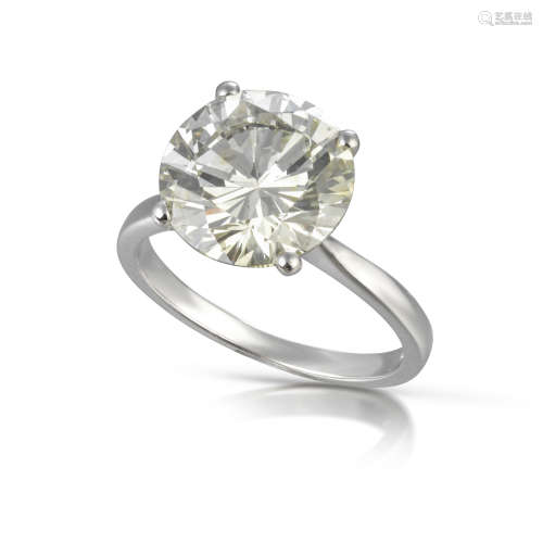 A diamond solitaire ring, the round brilliant-cut diamond weighs 5.36cts and is claw set in
