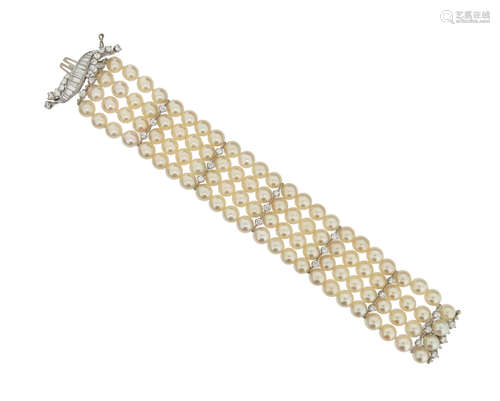 A diamond and cultured pearl bracelet, formed as four rows of cultured pearls measuring