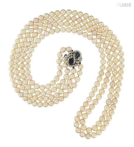 A two-row cultured pearl necklace, set with a sapphire and diamond scroll clasp in white gold,