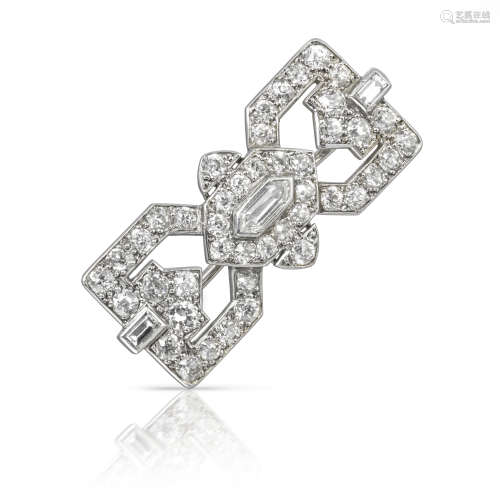 A diamond-set Art Deco brooch by Cartier, centred with a lozenge-shaped diamond and set overall with