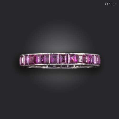 A ruby full-circle eternity ring, channel-set with calibre-cut rubies in platinum, size O