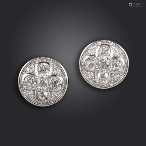 A pair of diamond-set disc earrings, set with a quatrefoil of old cushion-shaped diamonds, pave-