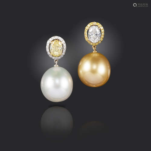 A pair of South Sea cultured pearl and diamond drop earrings, the slightly drop-shaped white