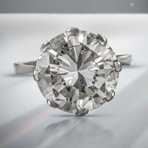 A diamond solitaire ring, the round brilliant-cut diamond weighs 12.51cts, claw set in platinum,