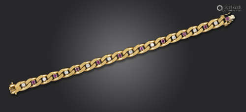 A gem-set gold bracelet, the yellow gold textured and polished flat curb links alternately set