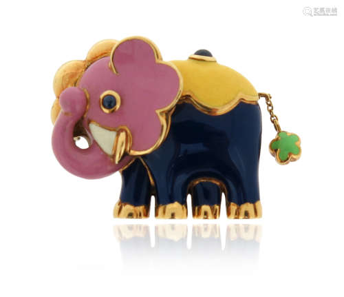 A gold and enamel elephant brooch, decorated with polychrome enamel and cabochon sapphires in yellow
