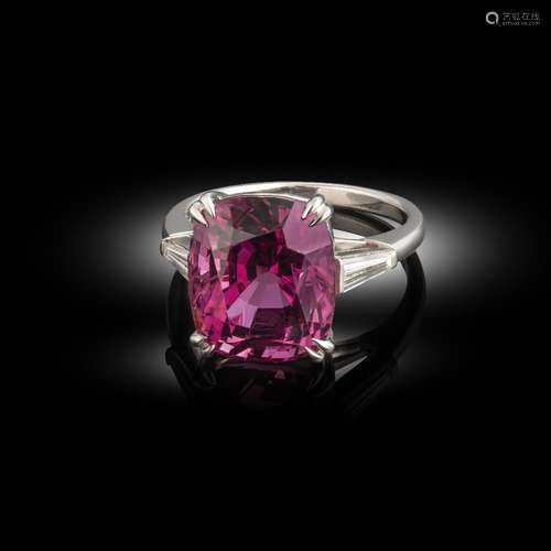 A pink spinel and diamond ring, the cushion-shaped spinel weighs 11.24cts, set with a tapered