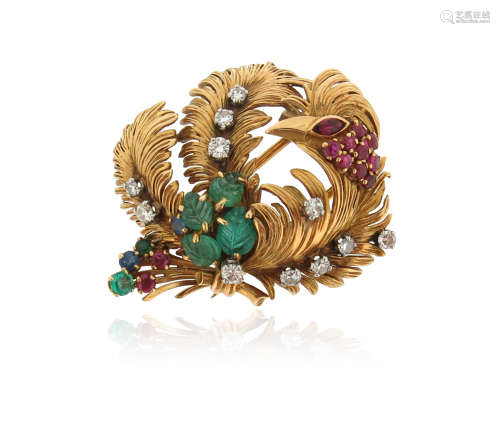 A French gem-set phoenix brooch, set with carved emeralds, rubies a sapphire and diamonds in