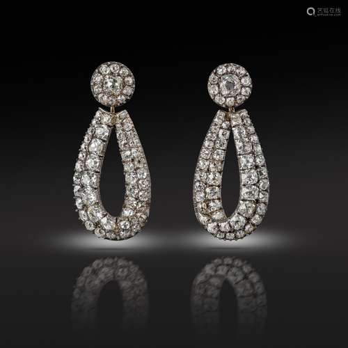 A pair of late George III diamond drop earrings, the old cushion-shaped diamond clusters suspend