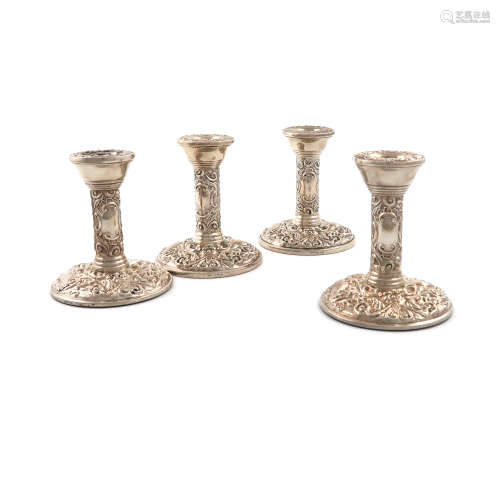 A matched set of four modern silver candlesticks, by W I Broadway & Co, Birmingham 1961 and 1978,