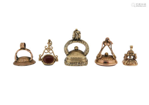 Five gold and gold-cased fob seals, set with various plain and engraved hardstone seal