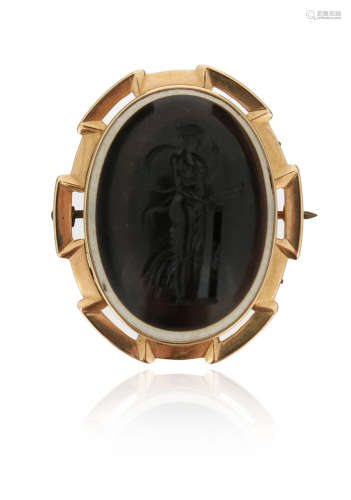 A 19th century banded agate intaglio brooch, depicting Cassandra in profile within yellow gold