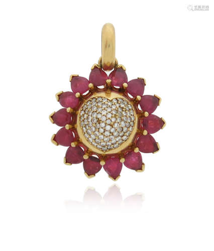 A ruby and diamond sunflower pendant, with a diamond-set heart-shaped centre and cabochon ruby
