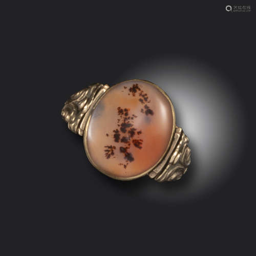 A Regency moss agate swivel ring, the oval panel set with moss agate to one side and a portrait to