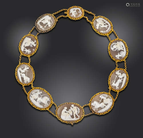 An early 19th century shell cameo gold suite of jewellery, including a necklace and brooch, the