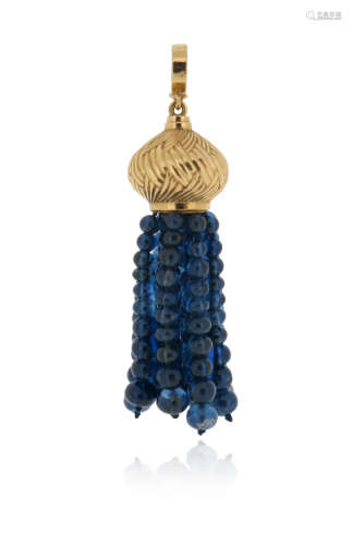 A sapphire bead tassel pendant, the gold engraved dome-form pendant suspends graduated sapphire