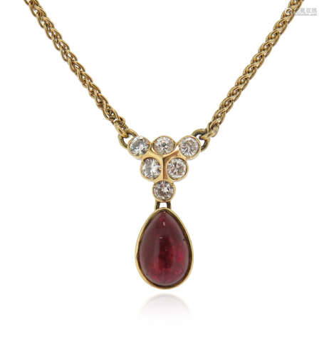 A ruby and diamond necklace, set with round brilliant-cut diamonds, suspending a cabochon ruby in