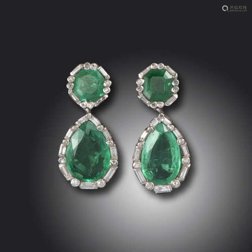 A pair of emerald and diamond drop earrings, each pear-shaped emerald set within a surround
