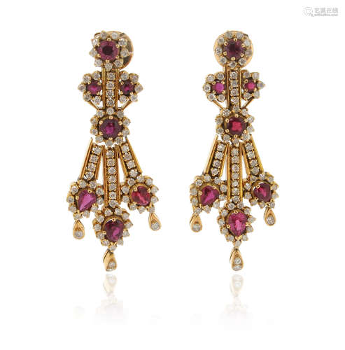 A pair of ruby and diamond drop earrings, set with ruby and diamond clusters suspended on lines of