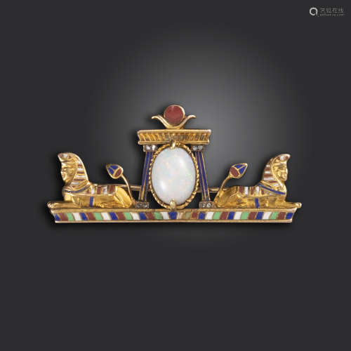 An early 20th century Egyptian Revival brooch, centred with an oval opal between two sphinxes and