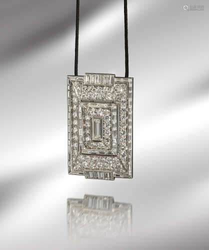 A French Art Deco diamond-set platinum pendant clip, of rectangular form, centred with a baguette-