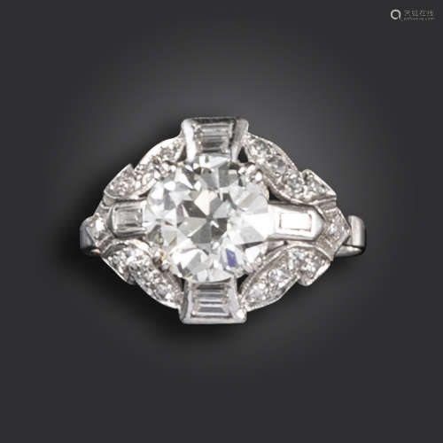 A diamond cluster ring, centred with an old circular-cut diamond weighing approximately 1.75cts,