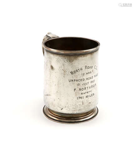 An Edwardian silver presentation mug, by The Goldsmiths and Silversmiths Company, London 1907,