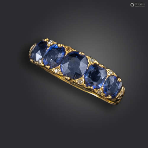 A Victorian sapphire half-hoop ring, the graduated cushion-shaped sapphires set with diamond