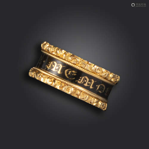 A George IV black enamel and gold mourning ring, decorated with the words 'IN MEMORY OF' in black