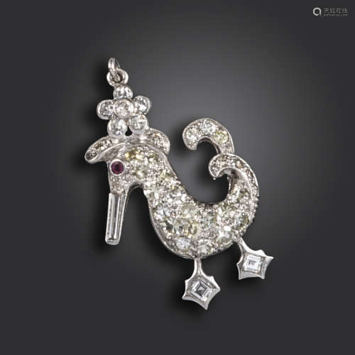 A diamond charm pendant, the duck pavι-set overall with circular-cut diamonds, with ruby eye and