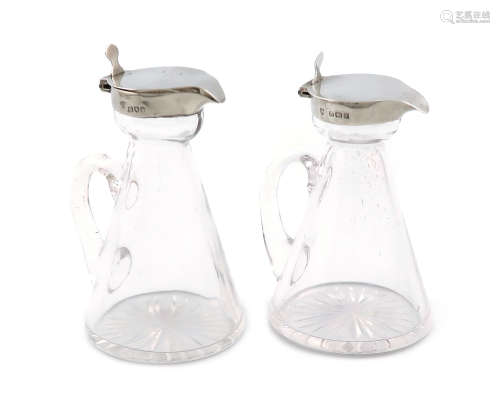 A matched pair of Edwardian silver-mounted glass whisky tots, two makers, London 1904 and Birmingham