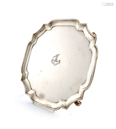 A silver salver, by The Goldsmiths and Silversmiths Company, London 1931, shaped square form,