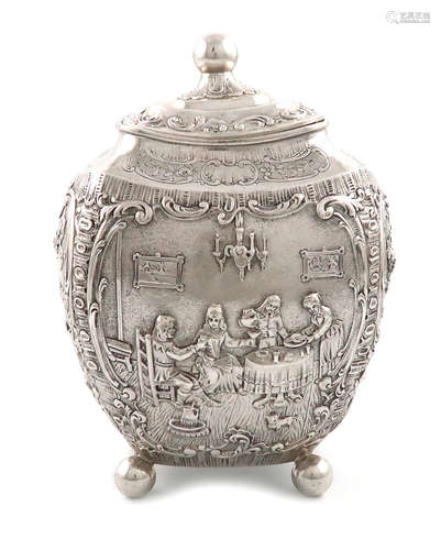 A German silver tea caddy, circa 1895, rounded tapering rectangular form, embossed with figural