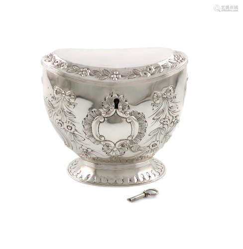 A Victorian silver tea caddy, by William Comyns, London 1888, oval form, embossed ribbon-tied