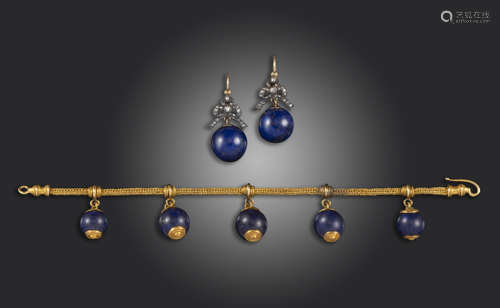 A 19th century Etruscan-style fine yellow gold mesh link bracelet, suspending five lapis lazuli