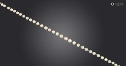 A single-row natural pearl necklace, the pearls graduate from 3.2 - 6.3mm, with a rose-cut diamond