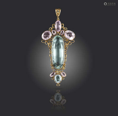 An early 20th century aquamarine and topaz pendant, set with graduated oval-shaped pink topazes